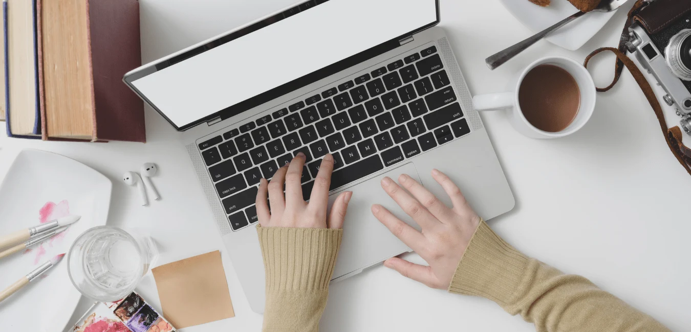 person typing on laptop